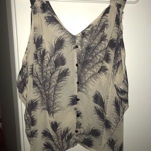 Sheer sleeveless top.